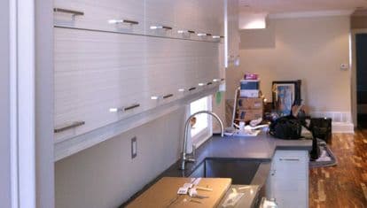 Completed Roomidea kitchen with streamlined cabinet storage