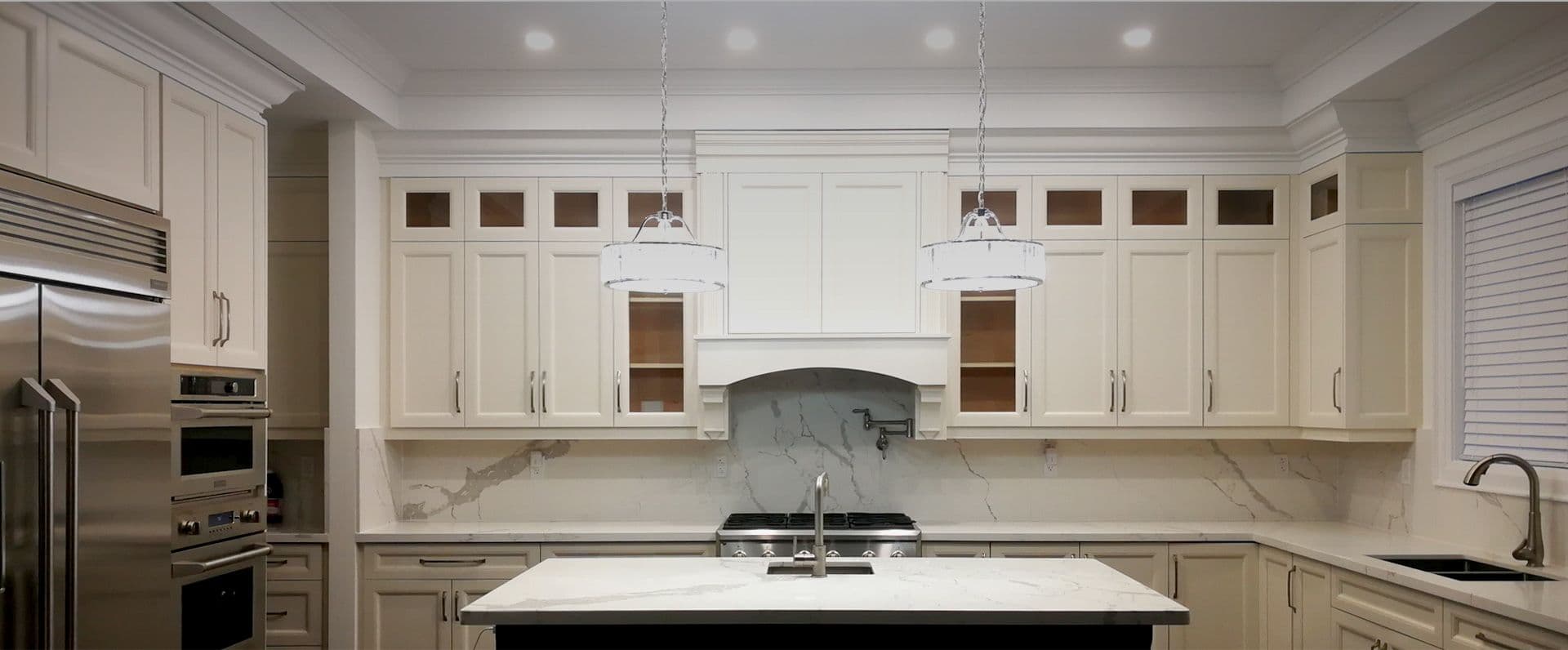 Completed Roomidea white kitchen cabinetry with fitted storage