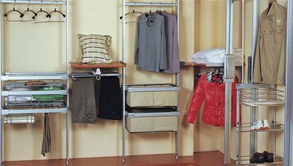 Completed Roomidea wardrobe storage with shelving, drawers, and hanging space