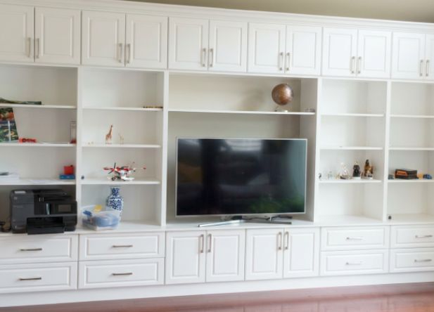 Completed Roomidea entertainment unit with media storage and display shelving