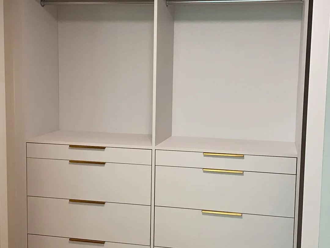Installed closet drawers designed for jewelry and small accessories.